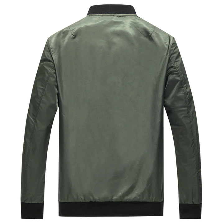 Man wearing a reversible bomber jacket
