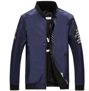 Man wearing a reversible bomber jacket