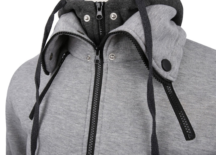 Man in a slim grey zip-up hoodie jacket