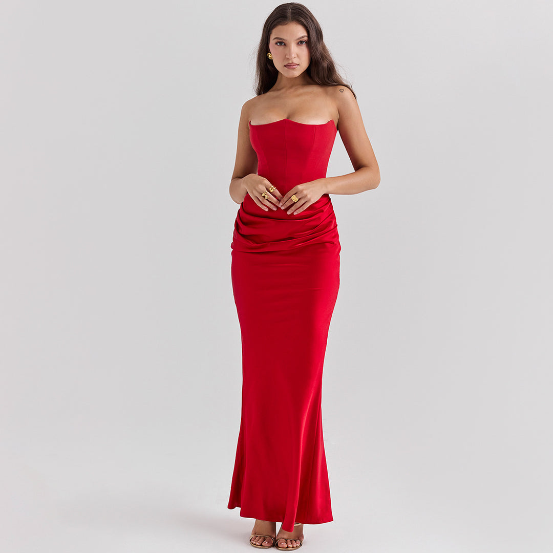 Woman in a strapless satin maxi dress