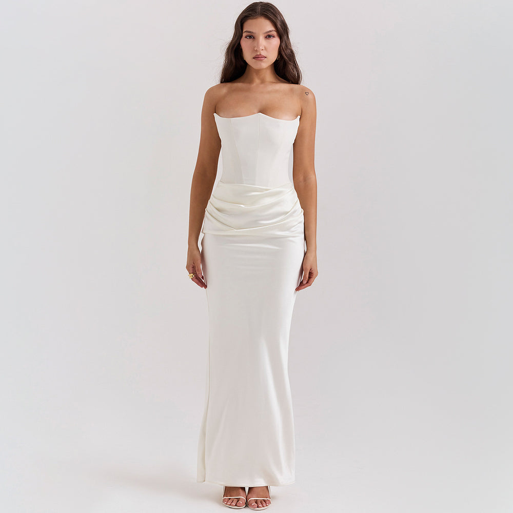 Woman in a strapless satin maxi dress