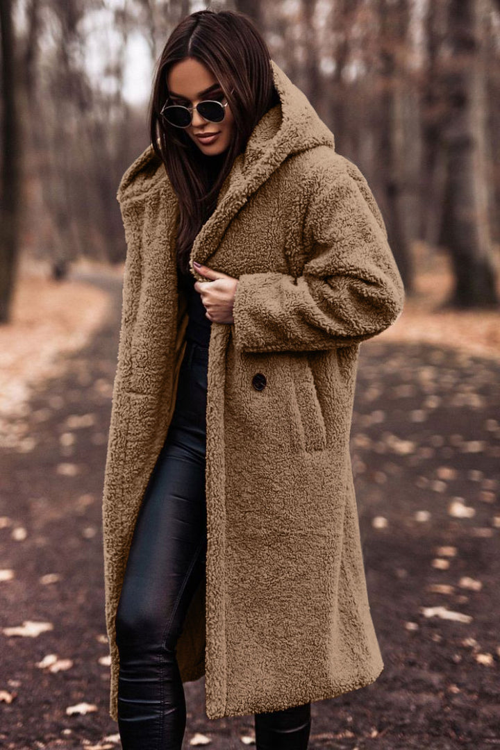 Woman in long hooded teddy coat