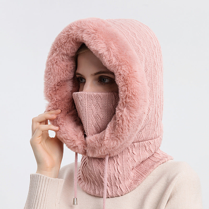 Knitted hood with faux fur trim