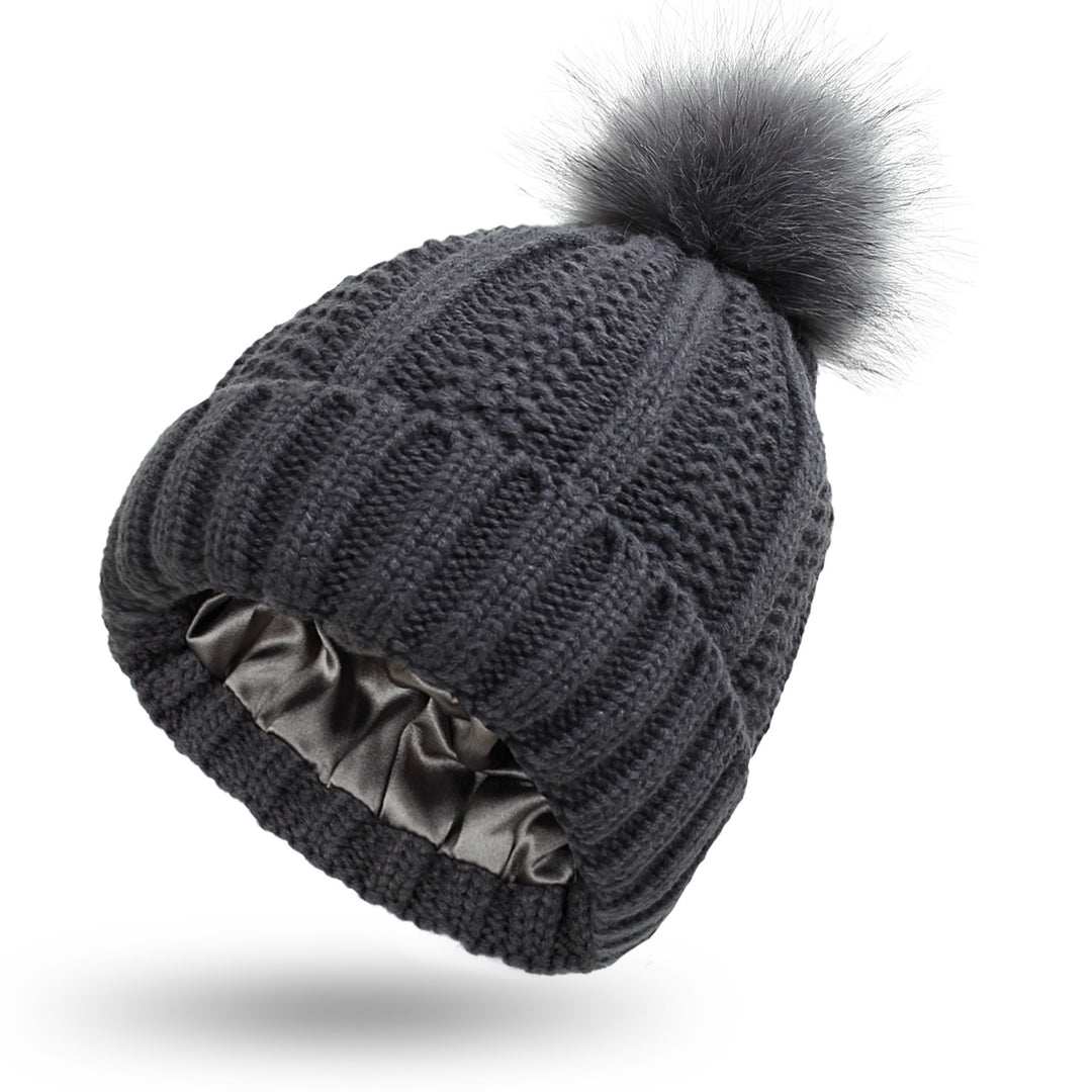 Chunky knit beanie with faux fur pom pom